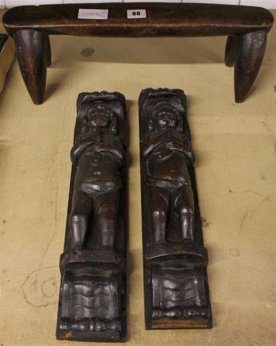 Pair carved wooden figural plaques and a stand